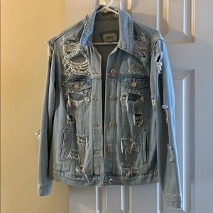 Distressed denim jacket